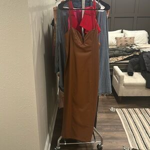 Women’s Zara long faux leather dress with slit down the back.